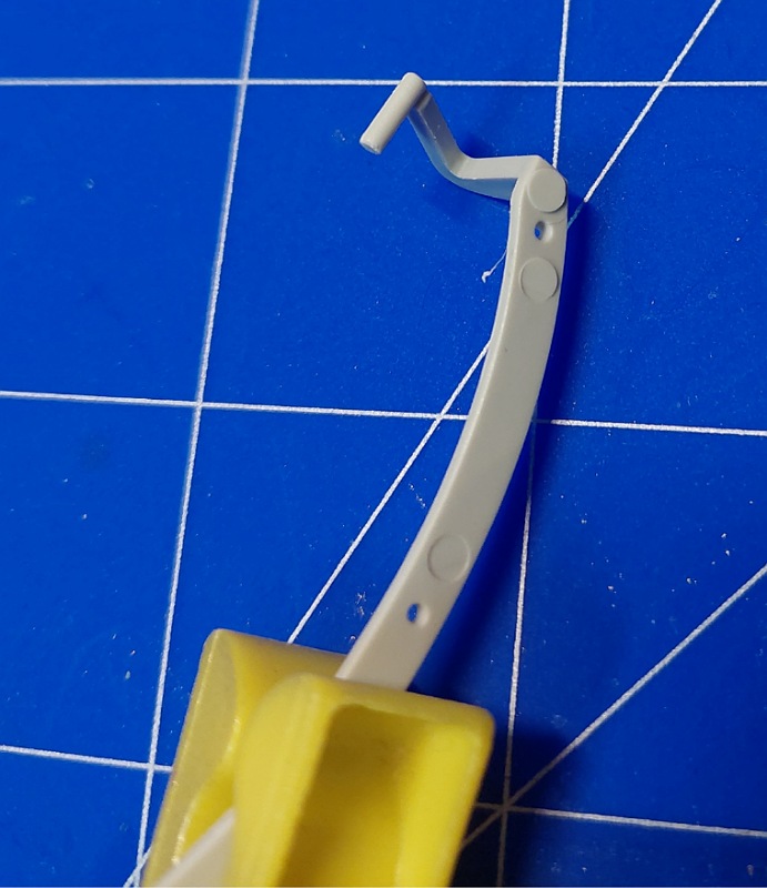 Scharnier, Auswurfmarken